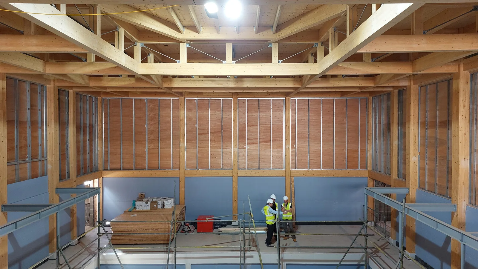 Inside the new Studio Theatre at The Hexagon, with the timber roof on and the auditorium taking shape.