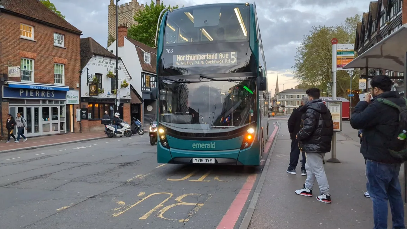 An emerald 5 at St Mary's Butts in central Reading. The 5 is one of nine services whose departure times change on 1 September